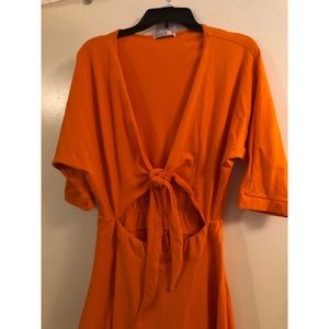 Orange knee length dress